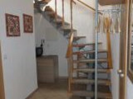 Steile Treppe ins Obergeschoss